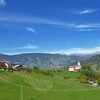 Meadows and farms at Tagusa. In the background, the Alps of Sarentino. Foto: AT, &copy; Peer